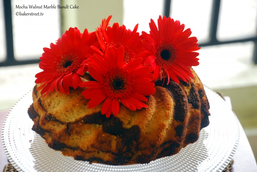 https://bakerstreet.tv/wp-content/uploads/2011/12/Mocha-Walnut-Marble-Bundt-Cake1-1024x685.jpg